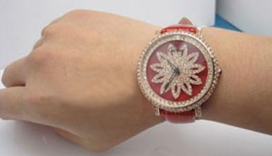 The luxury replica Cartier watches are made from rose gold and decorated with diamonds.