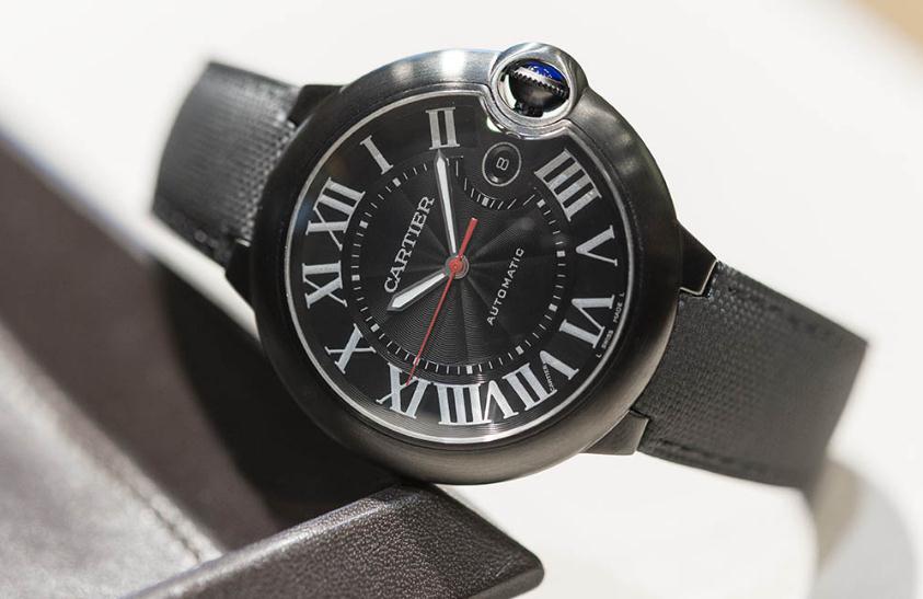 The stainless steel fake watches have black straps.
